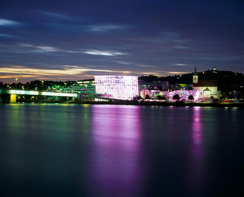 Ars Electronica Center on the Danube River showcasing digital art and technology