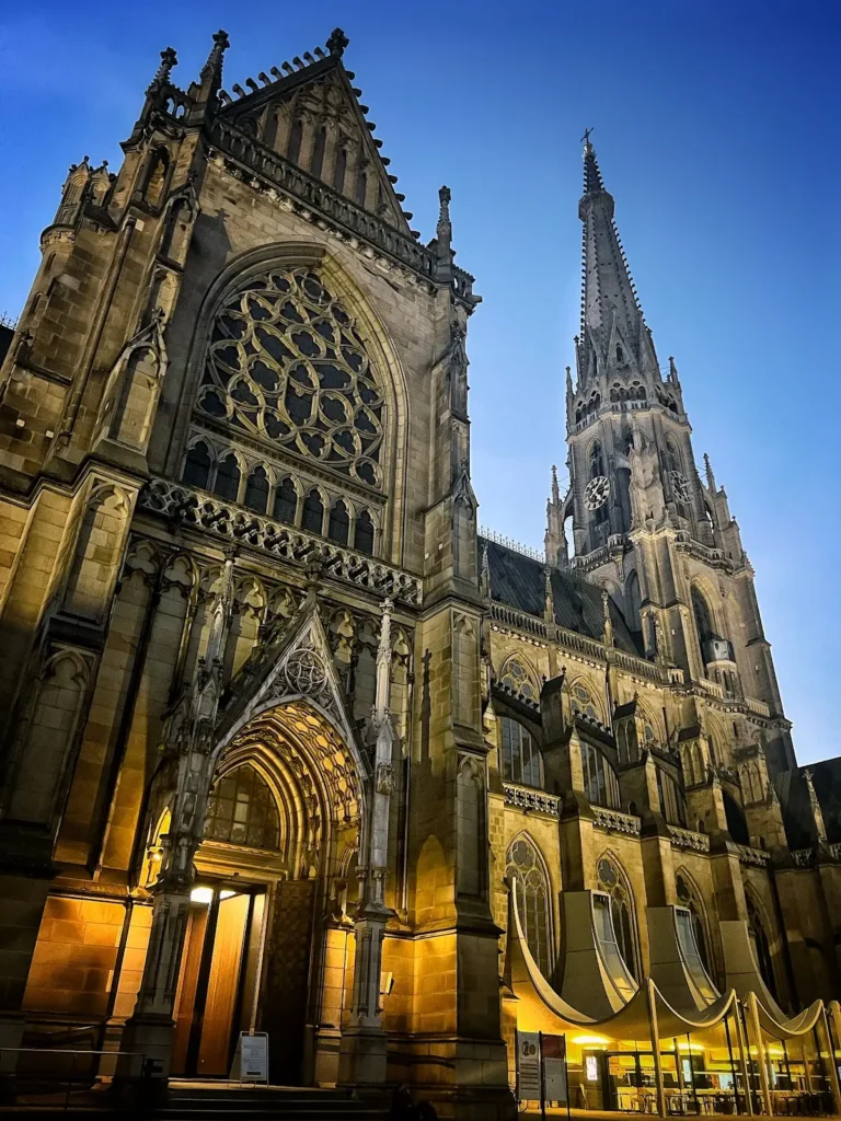 Illuminated Neuer Dom cathedral at night in Linz Austria